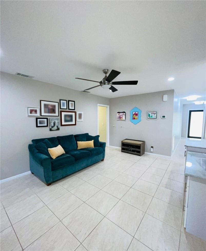 2358 Northwest 31st Street Boca Raton, FL 33431 - Photo 8 of 11 a living room with furniture and a table