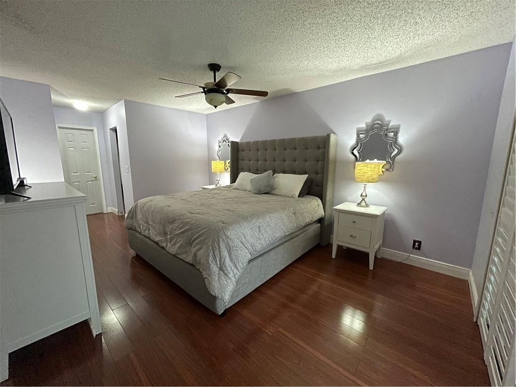 2358 Northwest 31st Street Boca Raton, FL 33431 - Photo 9 of 11 a bedroom with a bed dresser and a window