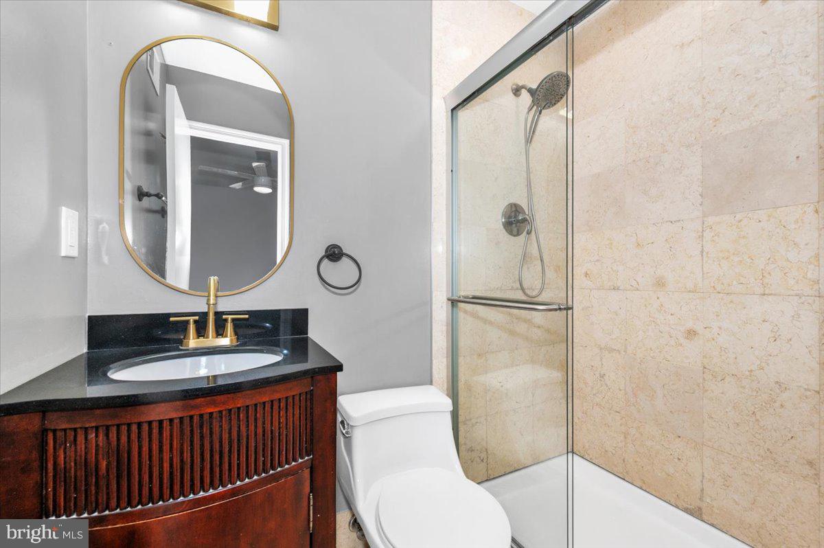 36 Castle Court Gaithersburg, MD 20878 - Photo 20 of 37 Sleek modern bathroom with elegance.