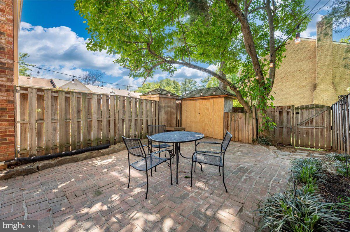 36 Castle Court Gaithersburg, MD 20878 - Photo 33 of 37 Charming patio under a leafy canopy.