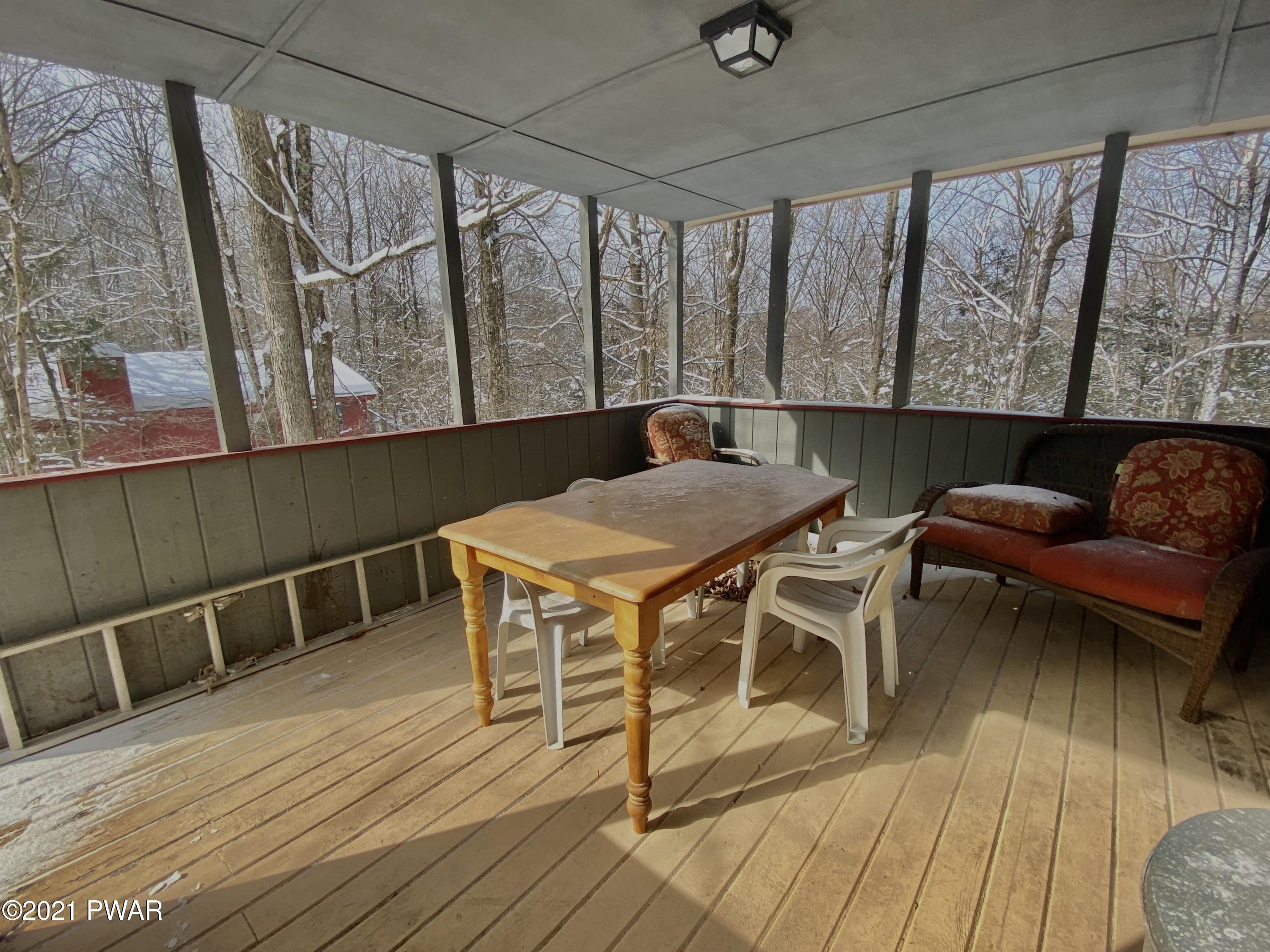 3104 Northgate Road Lake Ariel, PA 18436 - Photo 3 of 25 a view of a dining room with furniture window and wooden floor