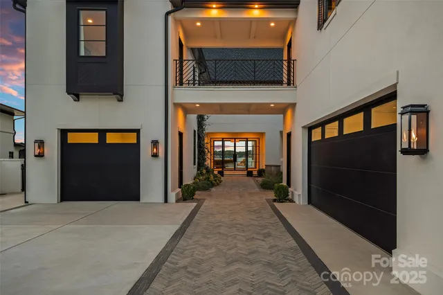 a view of a hallway with wooden floor and a fireplace