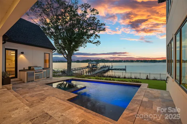 a view of a balcony with chairs