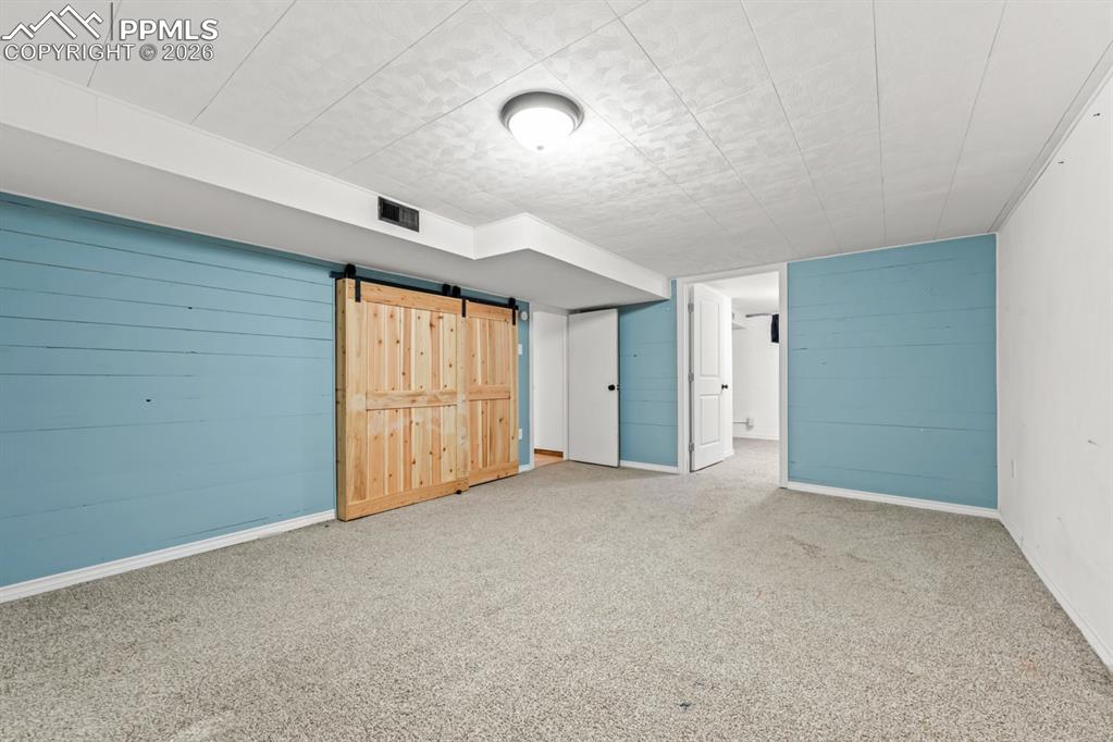 522 Madison Street Pueblo, CO 81004 - Photo 17 of 33 a view of an empty room with a window