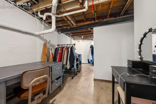 a bedroom with a bed and furniture