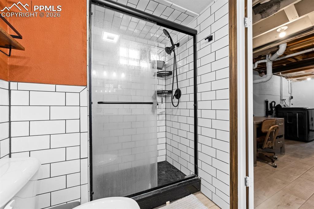 522 Madison Street Pueblo, CO 81004 - Photo 20 of 33 a bathroom with a shower