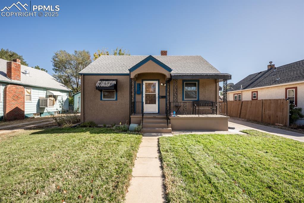 522 Madison Street Pueblo, CO 81004 - Photo 2 of 33 a house view with a outdoor space