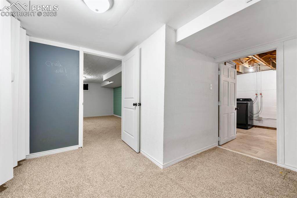 522 Madison Street Pueblo, CO 81004 - Photo 22 of 33 an empty room with a bathroom and a sink