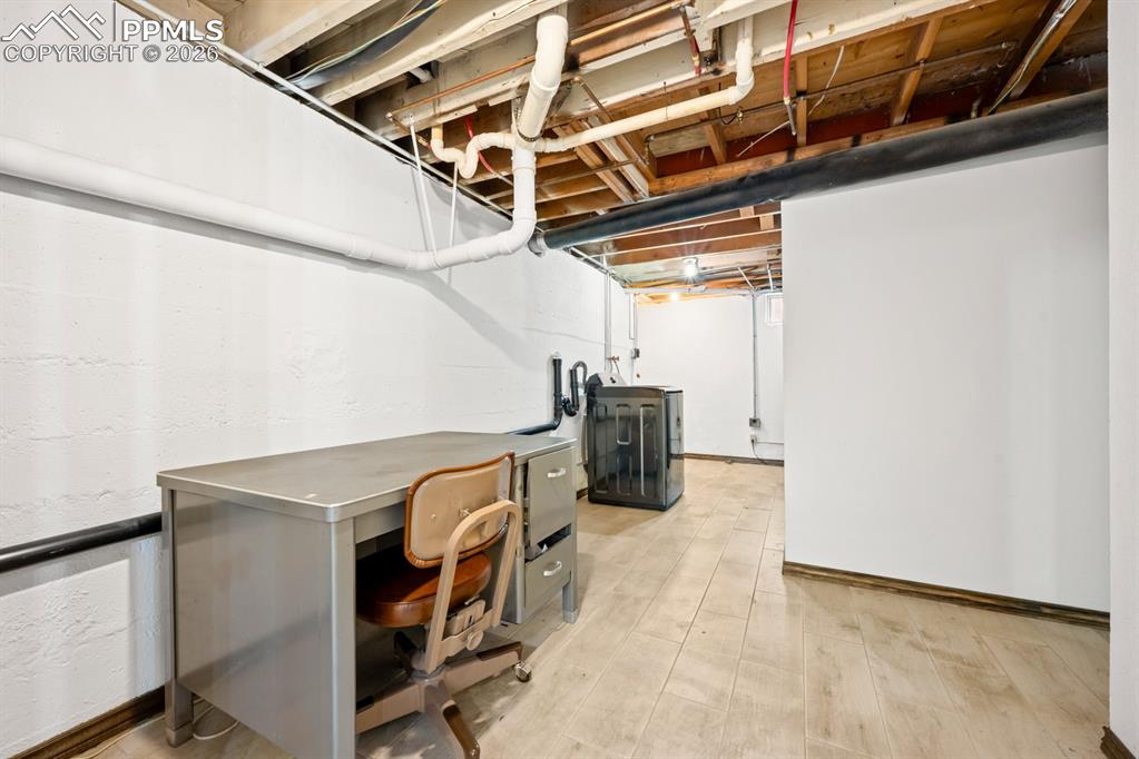 522 Madison Street Pueblo, CO 81004 - Photo 23 of 33 a utility room with dryer and washer