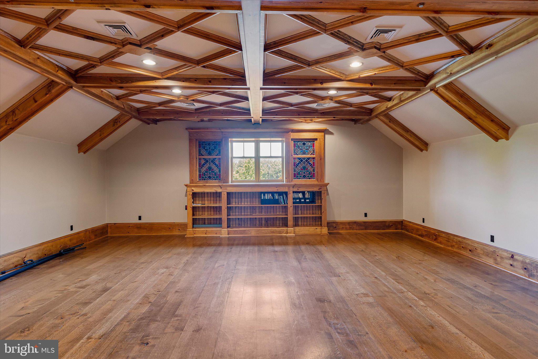 1455 Cayots Corner Road Chesapeake City, MD 21915 - Photo 24 of 141 a view of a room with wooden floors and lots of racks