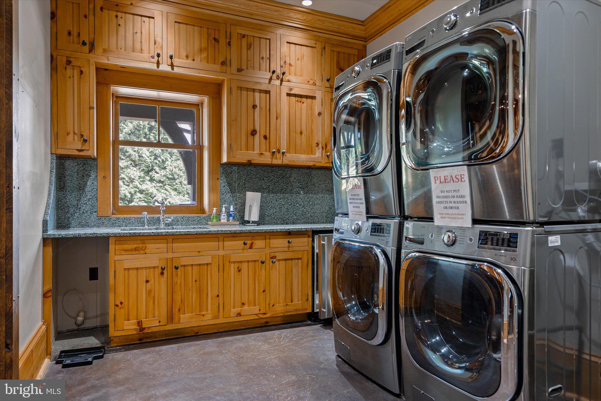 1455 Cayots Corner Road Chesapeake City, MD 21915 - Photo 45 of 141 a utility room with dryer and washer