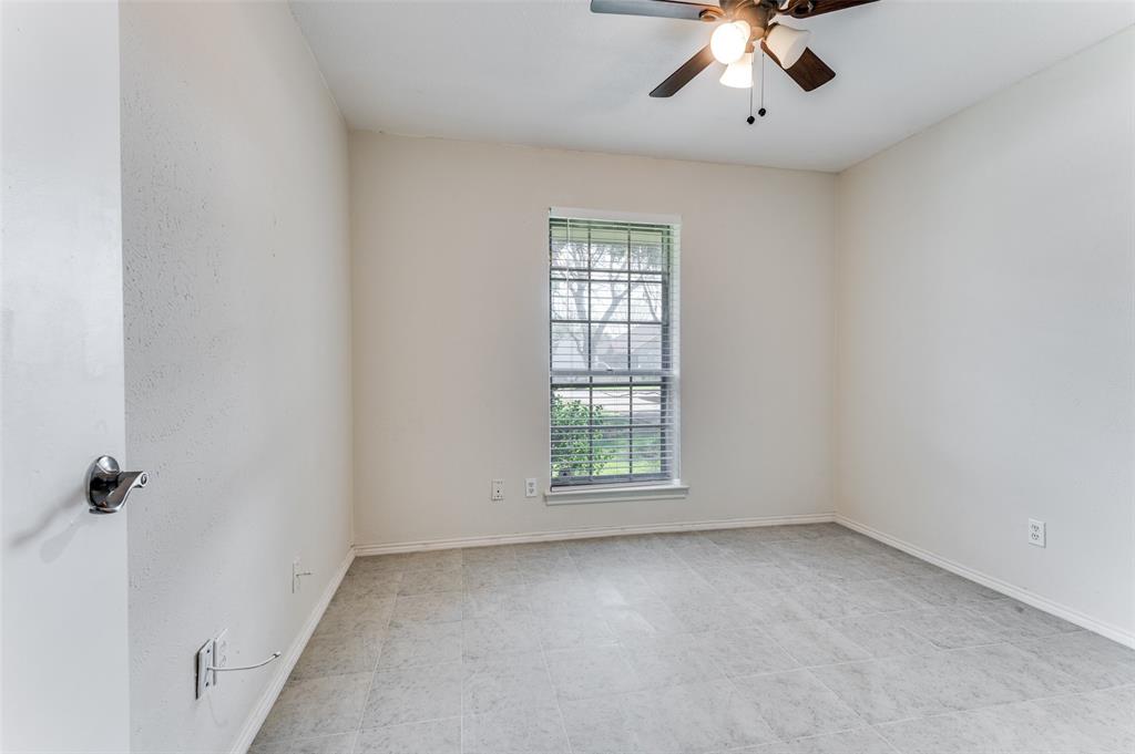 1805 Etain Road Irving, TX 75060 - Photo 17 of 23 an empty room with a window