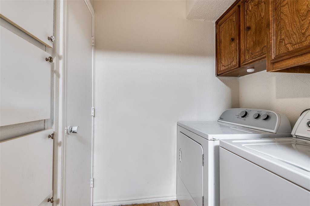1805 Etain Road Irving, TX 75060 - Photo 20 of 23 a utility room with dryer and washer