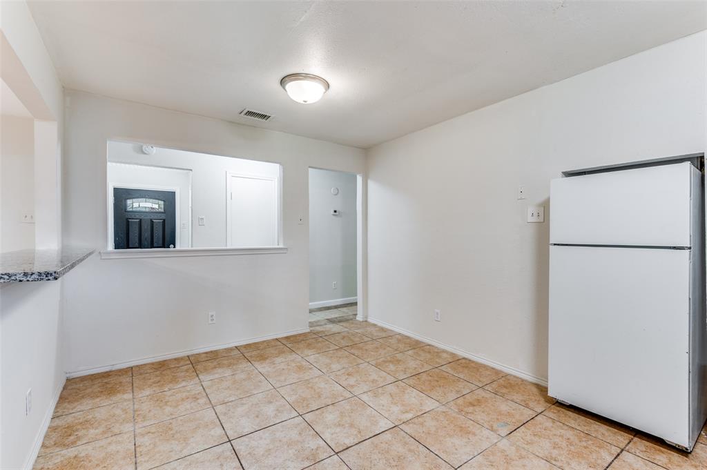 1805 Etain Road Irving, TX 75060 - Photo 7 of 23 a view of an empty room