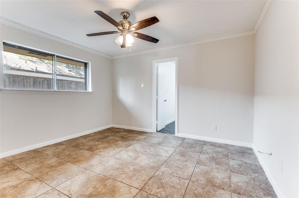 1805 Etain Road Irving, TX 75060 - Photo 9 of 23 a view of an empty room with a window