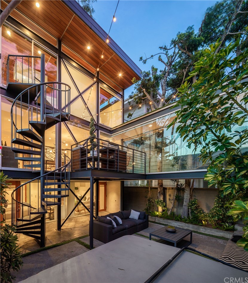 a view of a building with sitting area