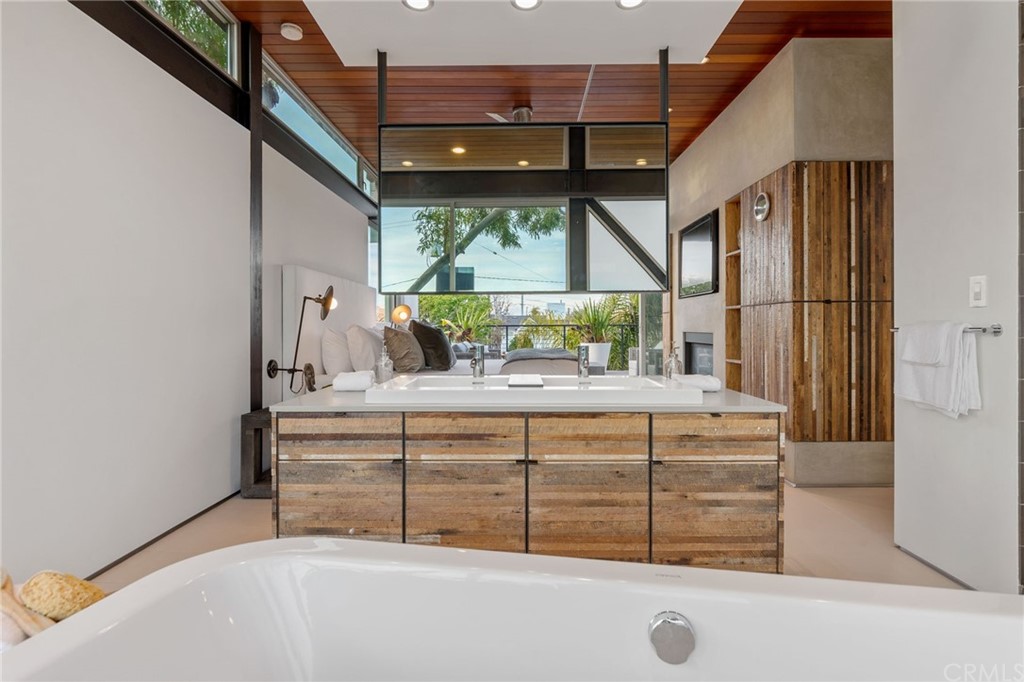 464 34th Street Manhattan Beach, CA 90266 - Photo 12 of 54 a bed room with a bed and a window