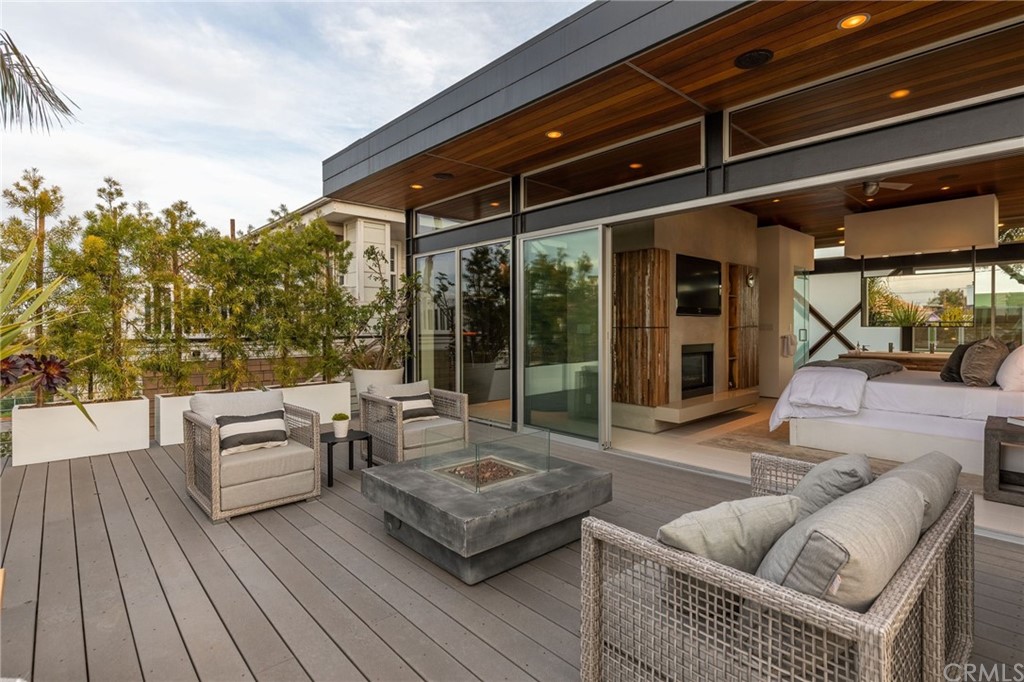 464 34th Street Manhattan Beach, CA 90266 - Photo 15 of 54 a outdoor living space with patio furniture and a fireplace