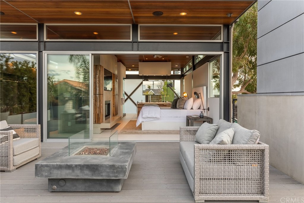 464 34th Street Manhattan Beach, CA 90266 - Photo 2 of 54 a living room with furniture and a floor to ceiling window