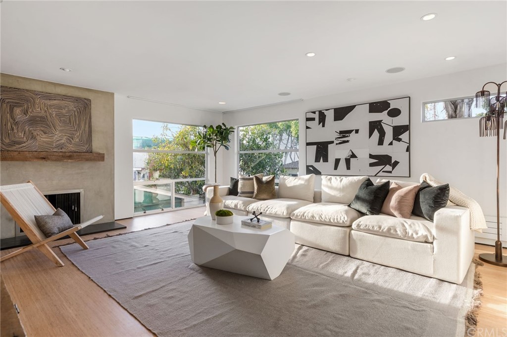464 34th Street Manhattan Beach, CA 90266 - Photo 31 of 54 a living room with furniture large window and flat screen tv