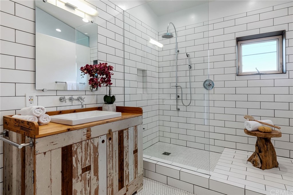 464 34th Street Manhattan Beach, CA 90266 - Photo 38 of 54 a bathroom with a sink a toilet and shower