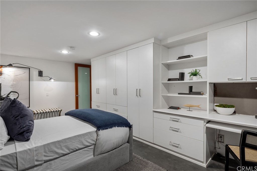464 34th Street Manhattan Beach, CA 90266 - Photo 42 of 54 a bedroom with a bed and a cabinets