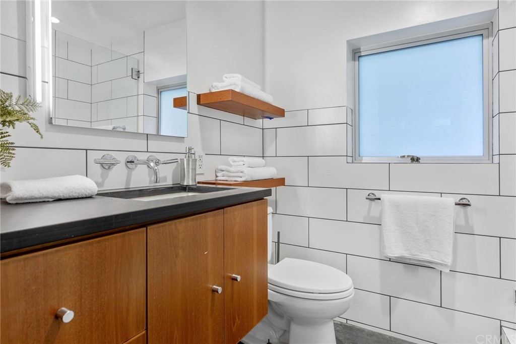 464 34th Street Manhattan Beach, CA 90266 - Photo 44 of 54 a bathroom with a sink and a toilet