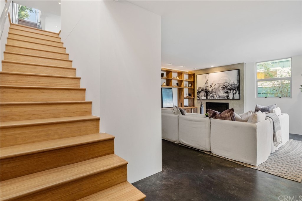 464 34th Street Manhattan Beach, CA 90266 - Photo 49 of 54 a living room with furniture and a table