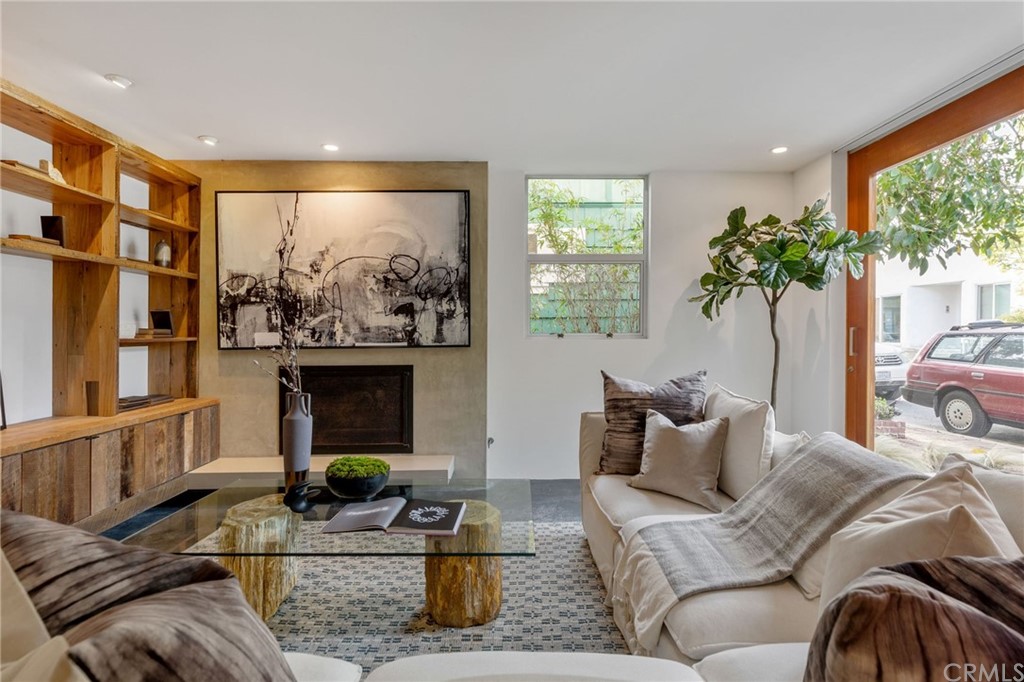 464 34th Street Manhattan Beach, CA 90266 - Photo 51 of 54 a living room with furniture large window and a fireplace