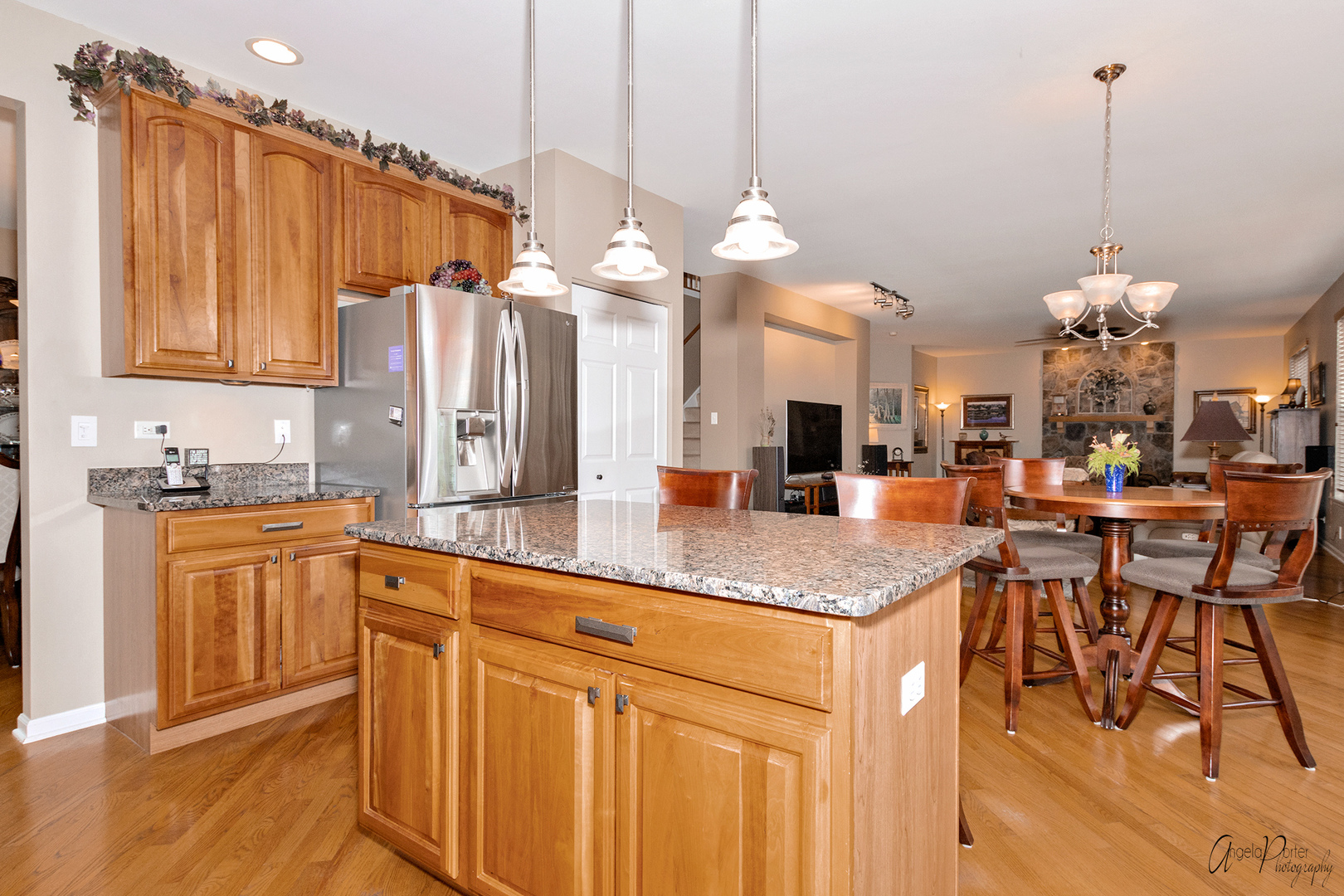 398 Sterling Circle Cary, IL 60013 - Photo 15 of 68 a kitchen with stainless steel appliances granite countertop a sink and cabinets
