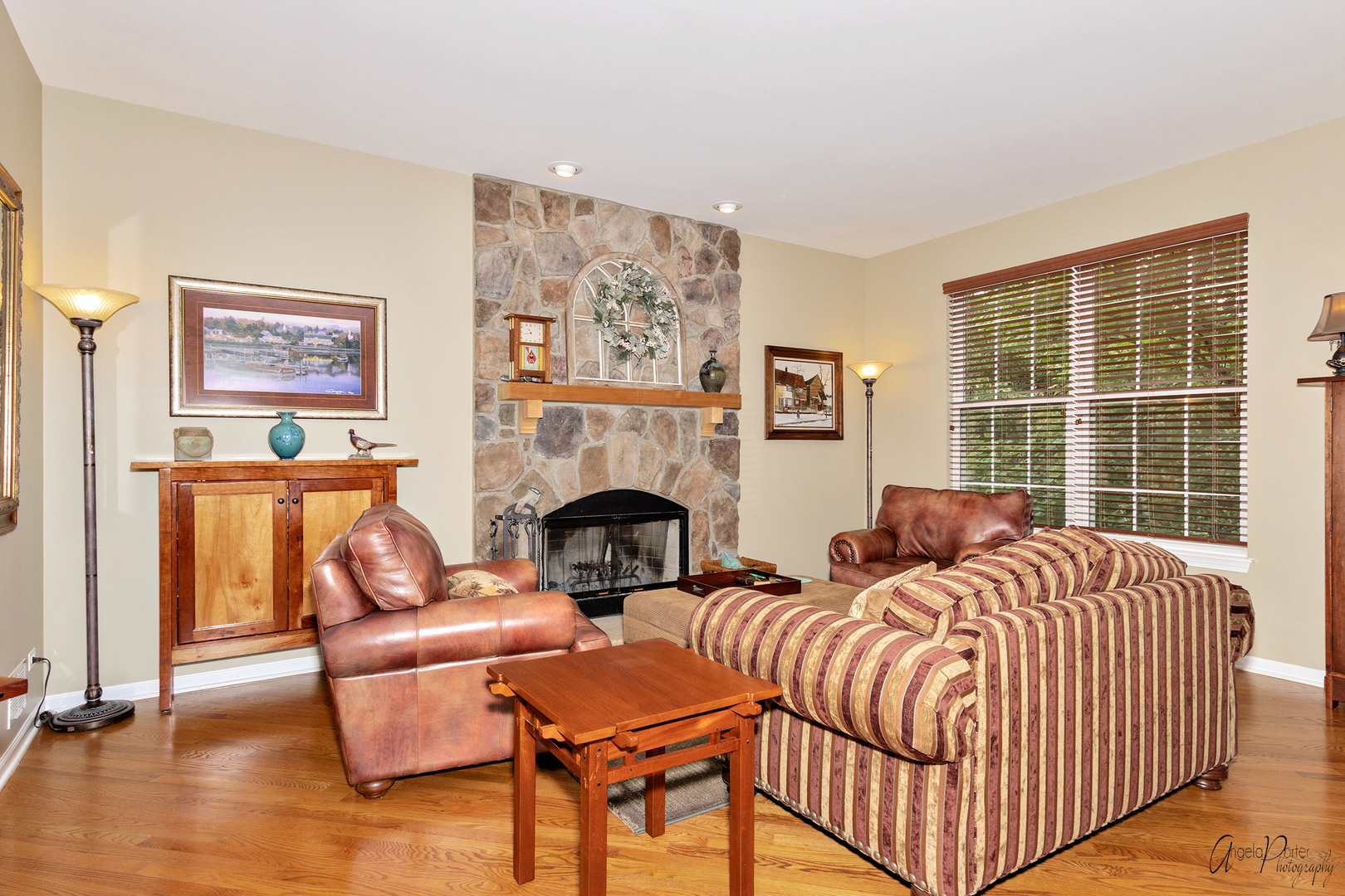 398 Sterling Circle Cary, IL 60013 - Photo 24 of 68 a bedroom with furniture and a fireplace
