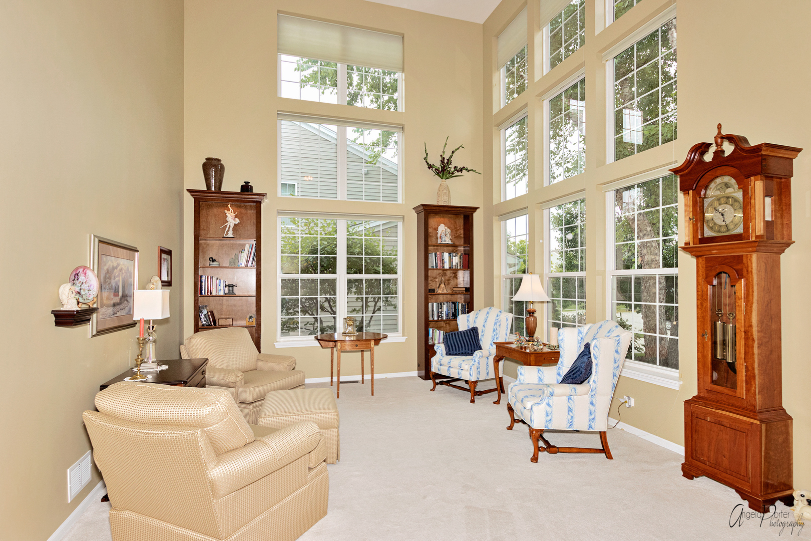 398 Sterling Circle Cary, IL 60013 - Photo 3 of 68 a living room with furniture a large window and flat screen tv