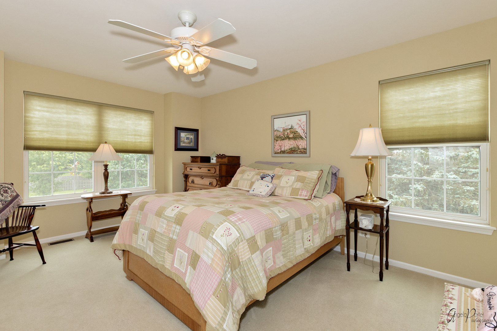 398 Sterling Circle Cary, IL 60013 - Photo 43 of 68 a bedroom with a bed and a chandelier