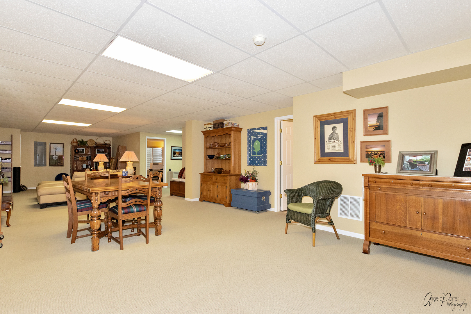 398 Sterling Circle Cary, IL 60013 - Photo 48 of 68 a living room with furniture and a dining table with wooden floor
