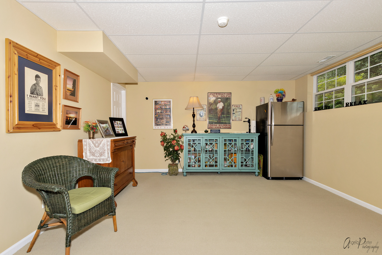 398 Sterling Circle Cary, IL 60013 - Photo 49 of 68 a living room with furniture a refrigerator and a table