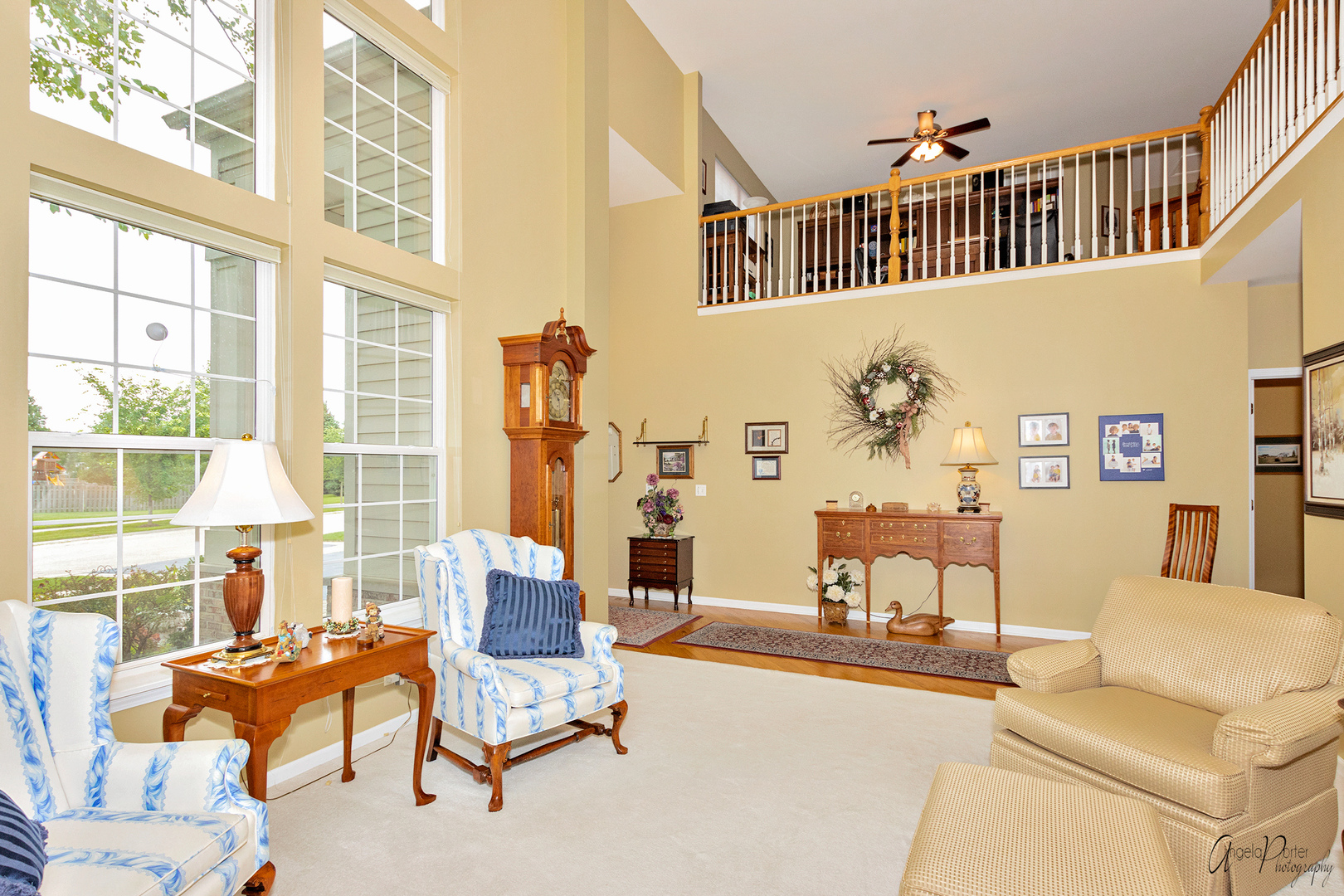 398 Sterling Circle Cary, IL 60013 - Photo 5 of 68 a living room with furniture and floor to ceiling windows