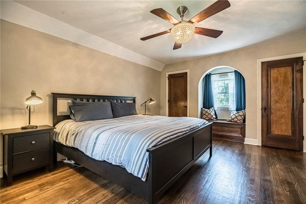 2814 Graham Boulevard Pittsburgh, PA 15235 - Photo 14 of 25 a bedroom with a large bed and a chandelier
