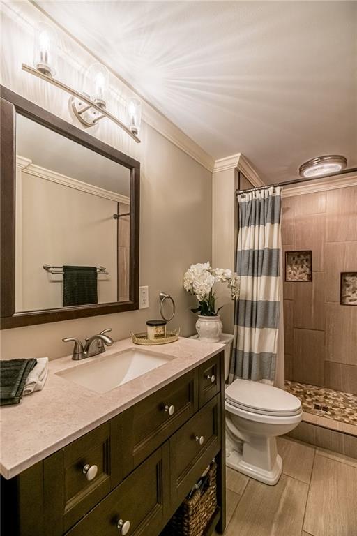 2814 Graham Boulevard Pittsburgh, PA 15235 - Photo 16 of 25 a bathroom with a sink a toilet and shower