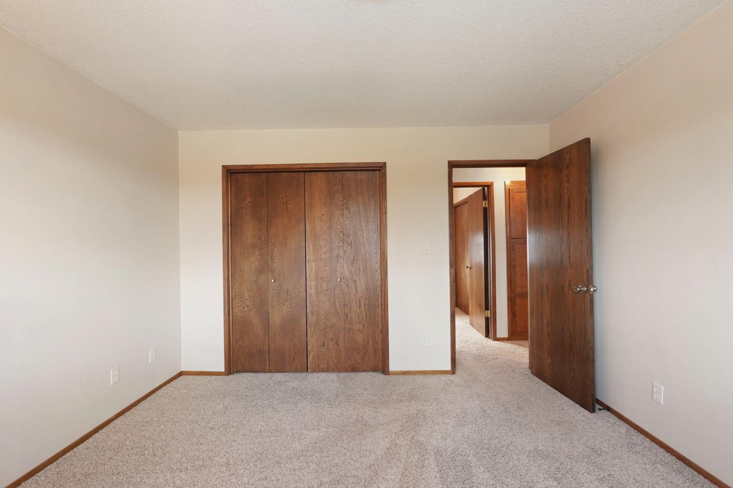 22022 South 99 Frontage Road Ripon, CA 95366 - Photo 31 of 46 an empty room with closet and a window