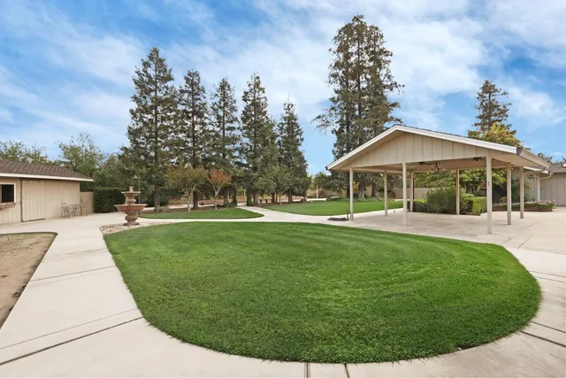 a view of house with garden