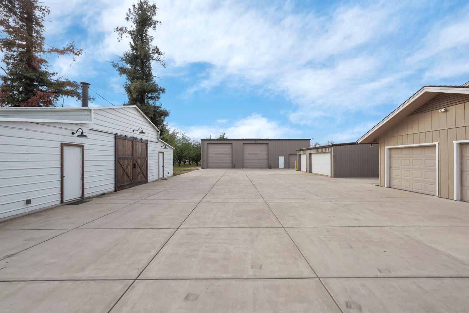 22022 South 99 Frontage Road Ripon, CA 95366 - Photo 44 of 46 a front view of a house with yard
