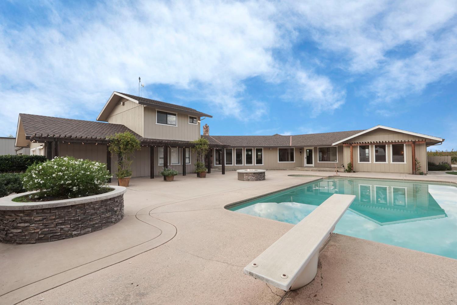 22022 South 99 Frontage Road Ripon, CA 95366 - Photo 5 of 46 a front view of a house with a yard