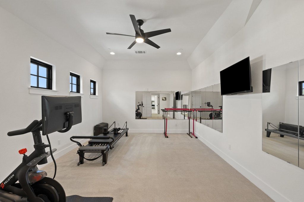 7516 Davenport Divide Road Austin, TX 78738 - Photo 26 of 40 A separate media room creates a private space for an exercise room or a theater room.