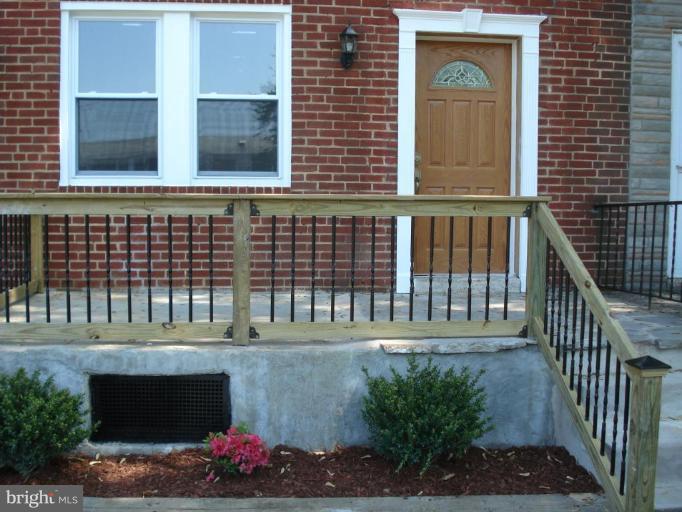 525 Old Riverside Road Brooklyn, MD 21225 - Photo 1 of 5 a front view of a house