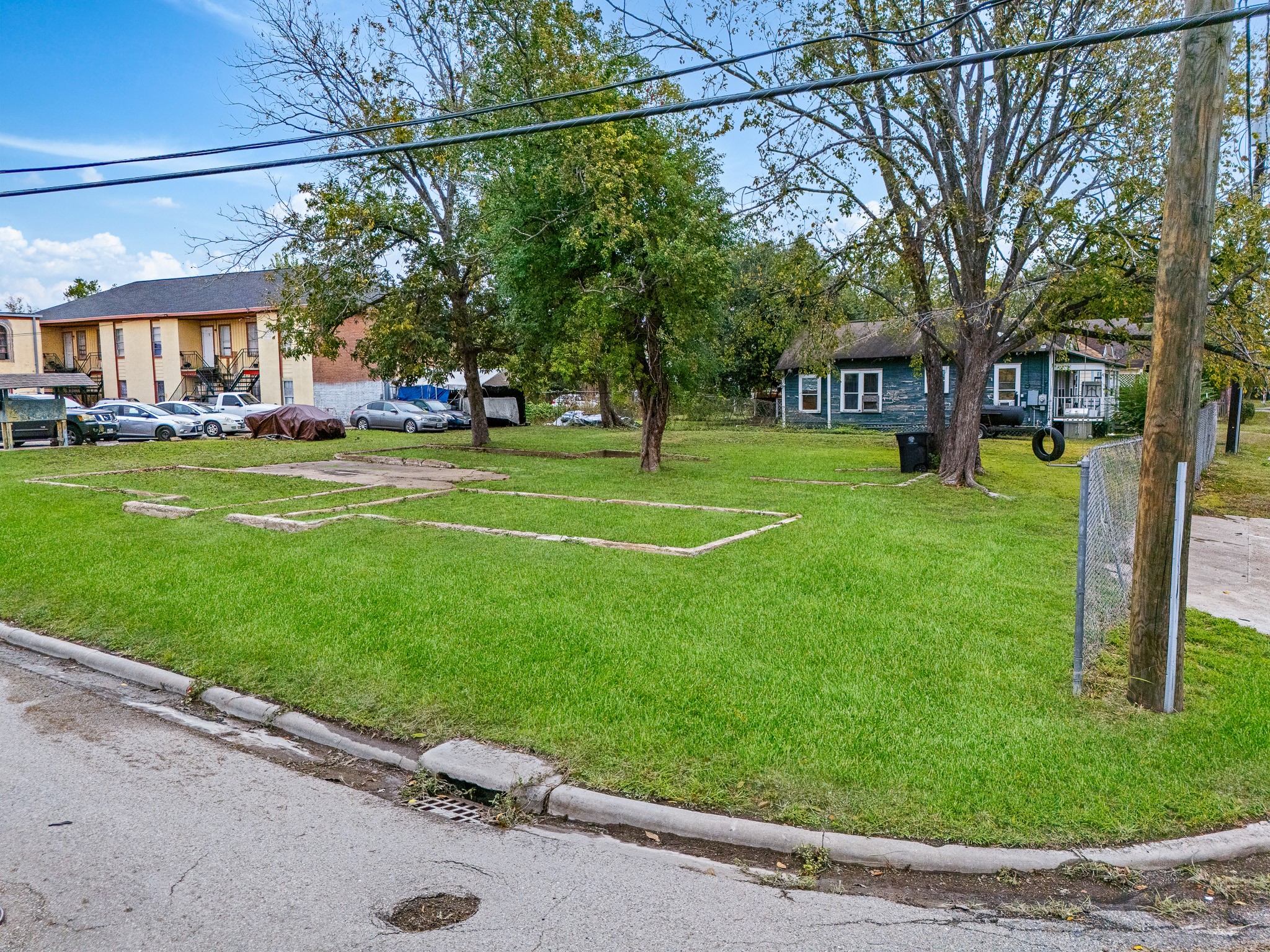 0 Sumpter Street Houston, TX 77026 - Photo 9 of 15 a front view of a house with a garden and trees