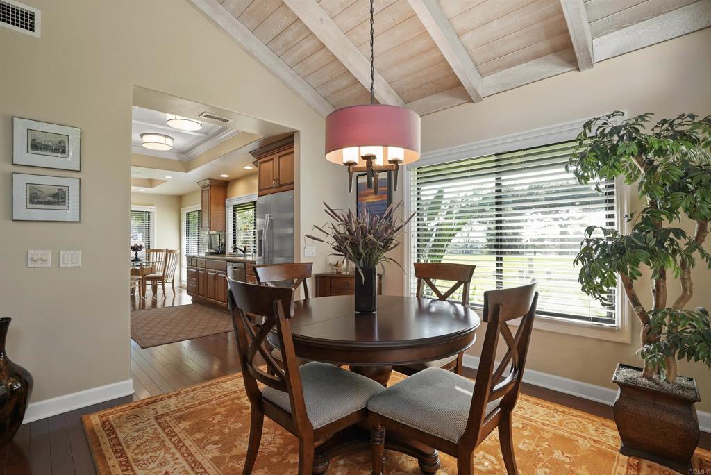 1320 Sun Valley Road Solana Beach, CA 92075 - Photo 17 of 36 a view of a dining room with furniture window and wooden floor