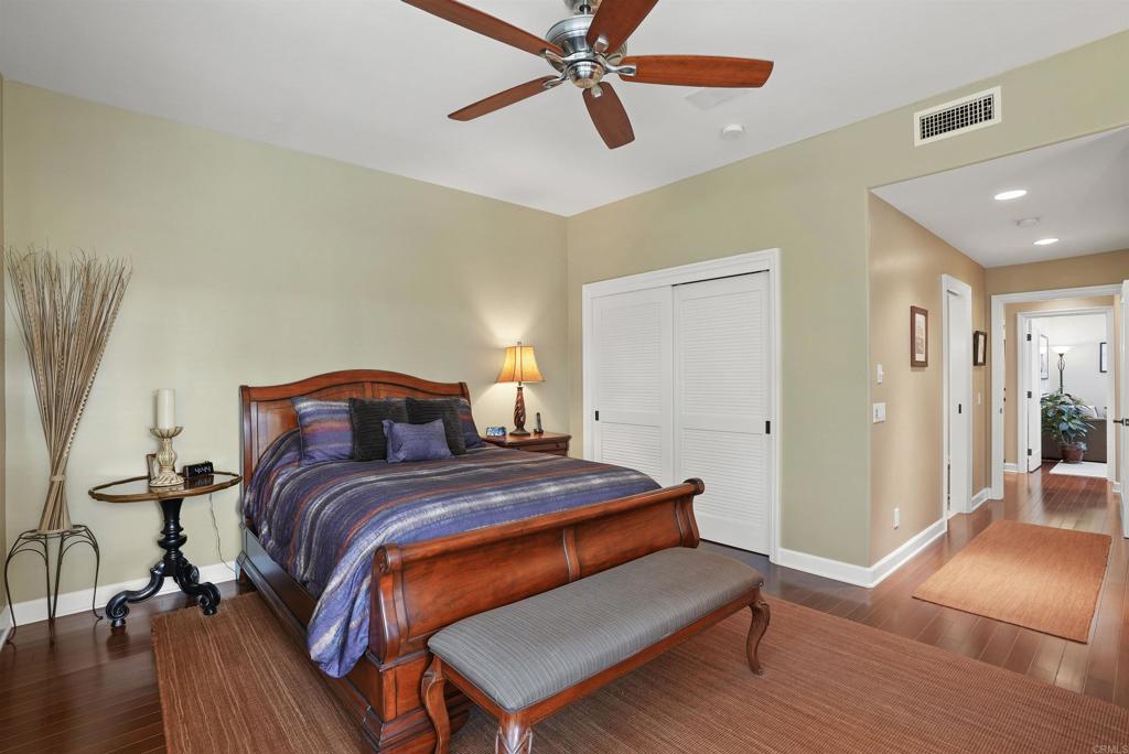 1320 Sun Valley Road Solana Beach, CA 92075 - Photo 26 of 36 a bedroom with bed and wooden floor