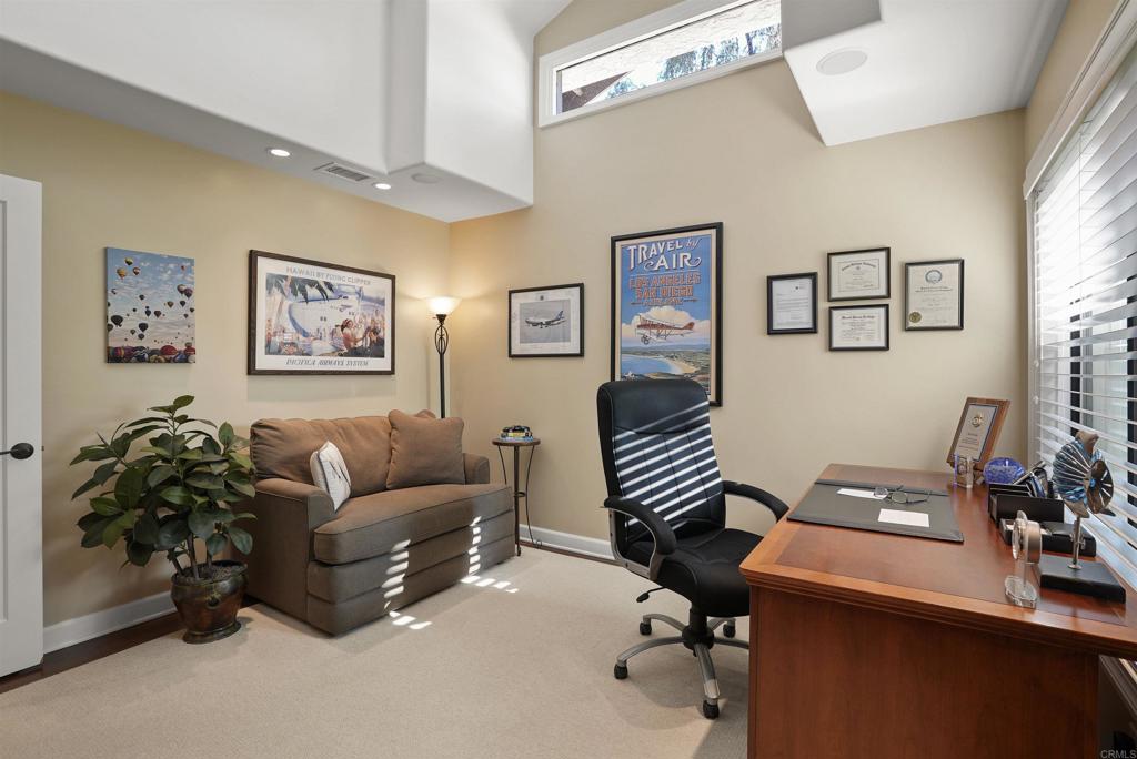 1320 Sun Valley Road Solana Beach, CA 92075 - Photo 32 of 36 a work room with furniture and paintings on the wall