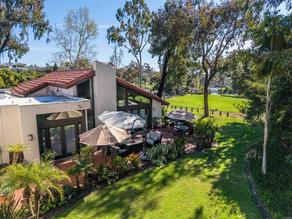 1320 Sun Valley Road Solana Beach, CA 92075 - Photo 4 of 36 a view of a house with a yard and sitting area