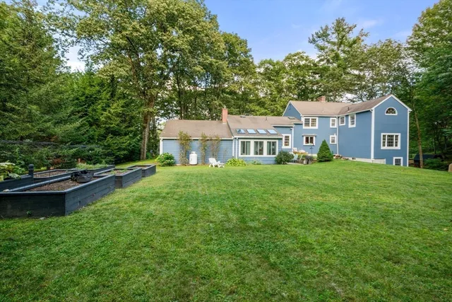 a view of a house with a yard from a house